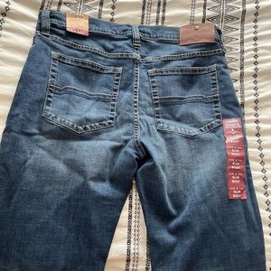 New with tags Cody James jeans. Size 33W x 34L Slim Boot